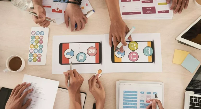 A Developer team working on an Music On-Demand App